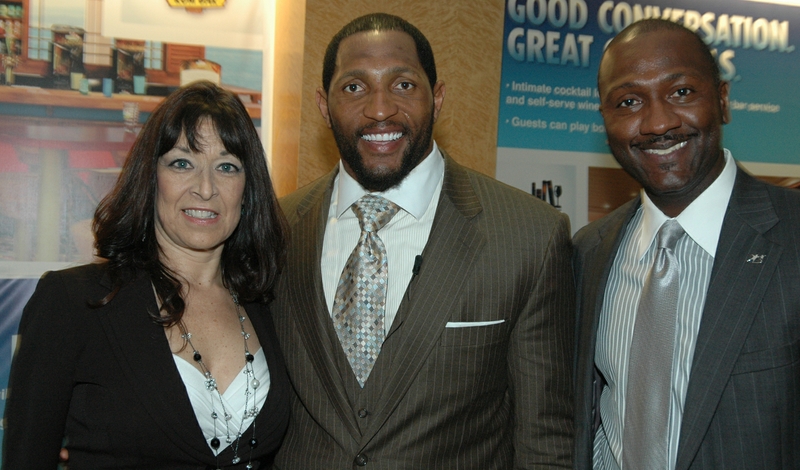 NFL legend Ray Lewis (center) is pictured here with Carnival Foundation Director Linda Coll (left) and Big Brother Big Sister Senior Vice President Gale Nelson