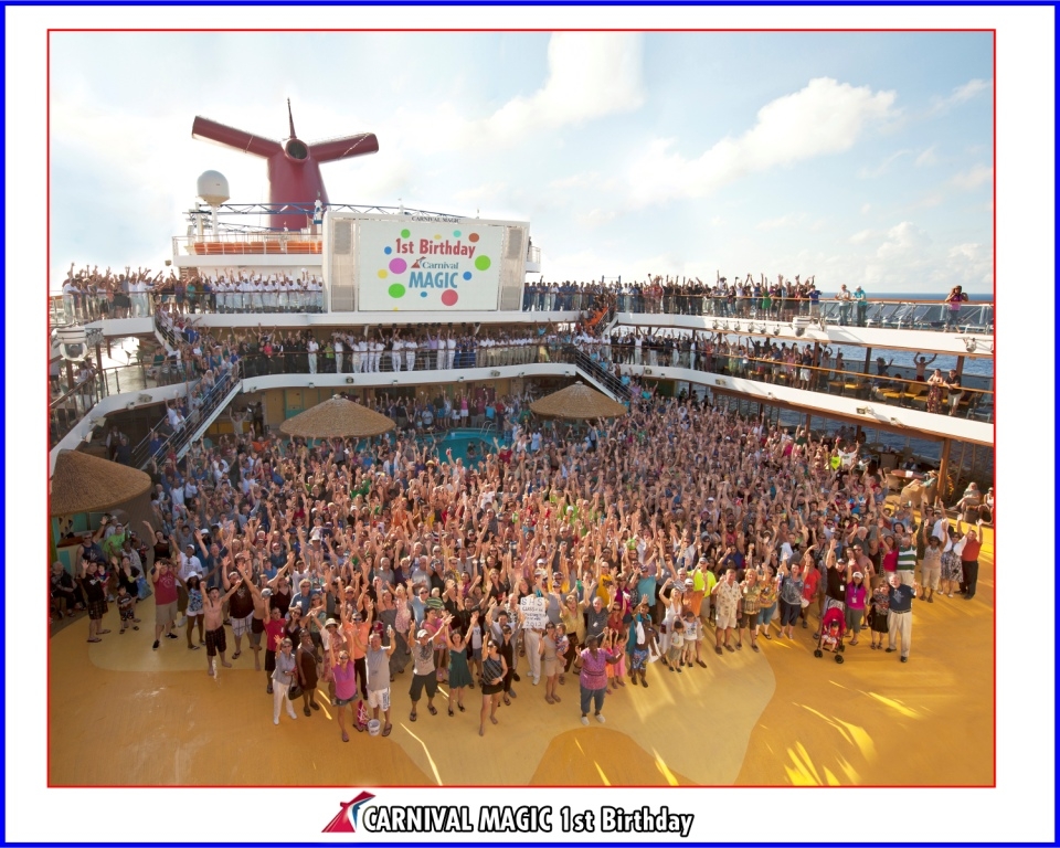 Guest and crew on the Carnival Magic celebrate the ship's first birthday with a fun-filled deck party.