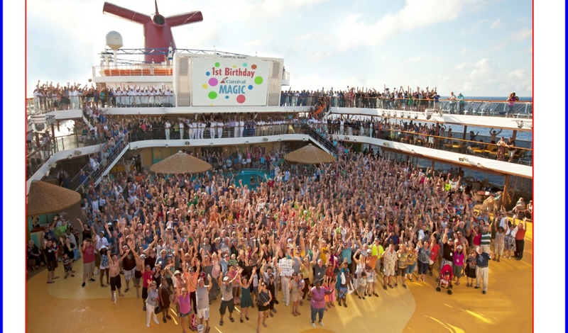 Guest and crew on the Carnival Magic celebrate the ship's first birthday with a fun-filled deck party.