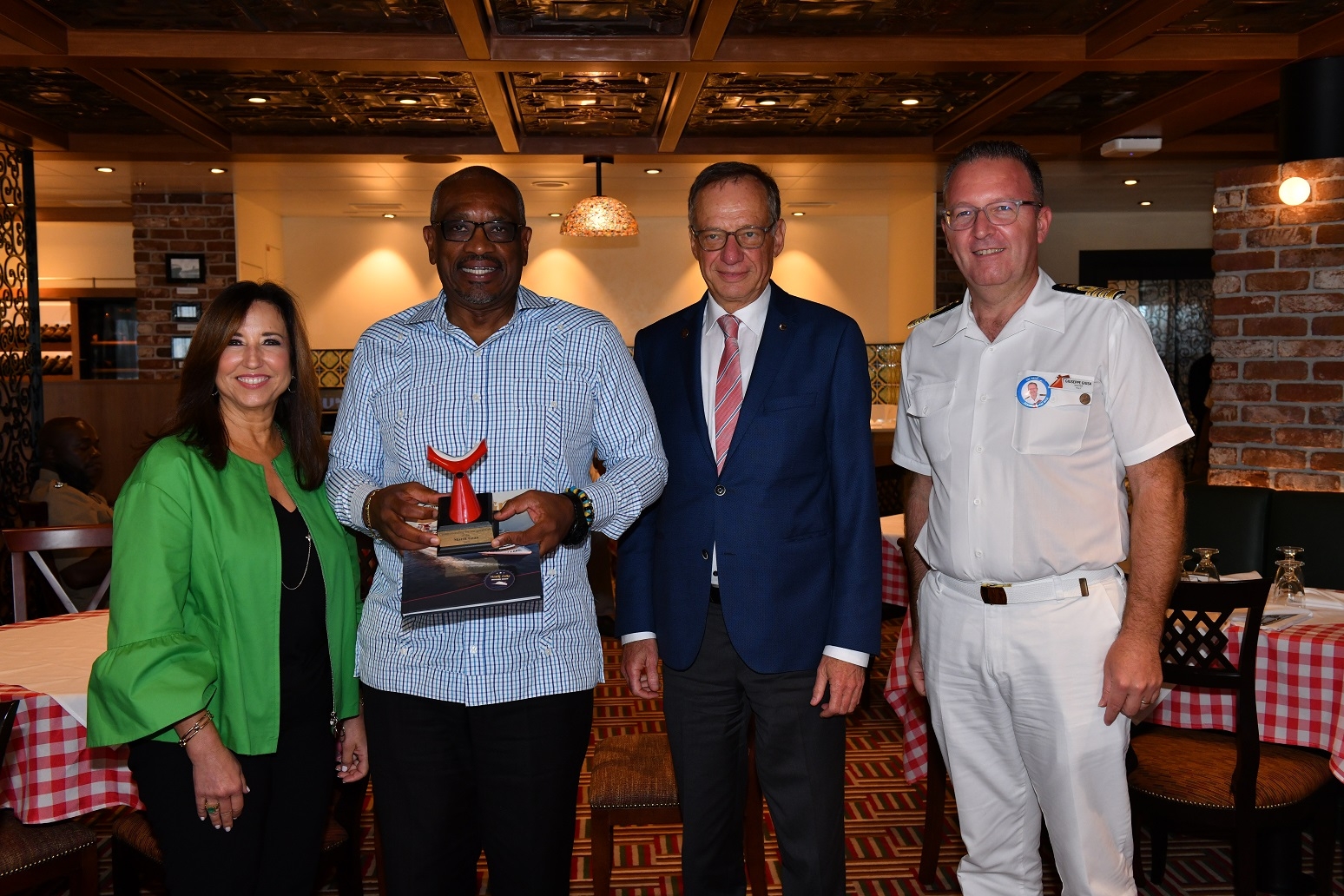 BEST - Christine Duffy; The Bahamas Prime Minister Dr. Hubert Minnis; Carnival Corporation Senior Vice President, Port & Destination Development, Giora Israel; and Mardi Gras Captain Guisa low res