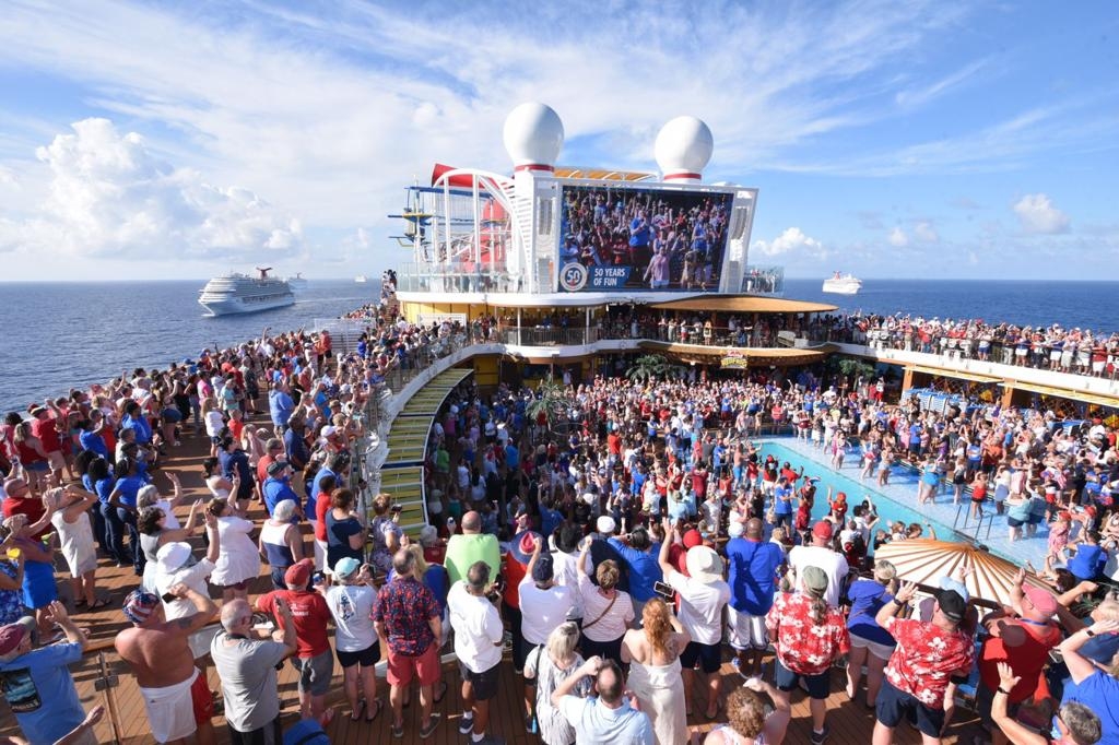 Carnival Breeze, Carnival Ecstasy, Carnival Glory, Mardi Gras, Carnival Pride, Carnival Sunrise and Carnival Vista – met up in Cozumel last night for one of the biggest birthday parties at sea.