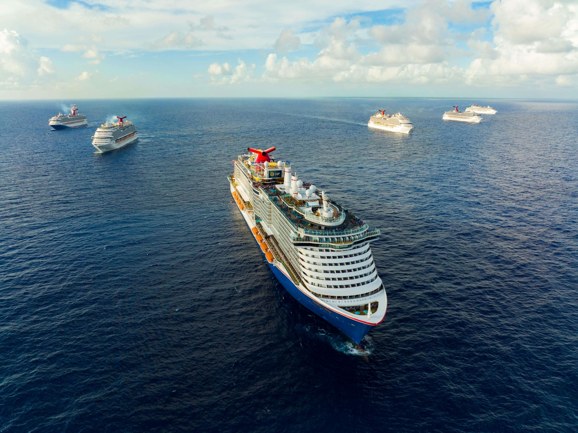 Carnival Breeze, Carnival Ecstasy, Carnival Glory, Mardi Gras, Carnival Pride, Carnival Sunrise and Carnival Vista – met up in Cozumel last night for one of the biggest birthday parties at sea.