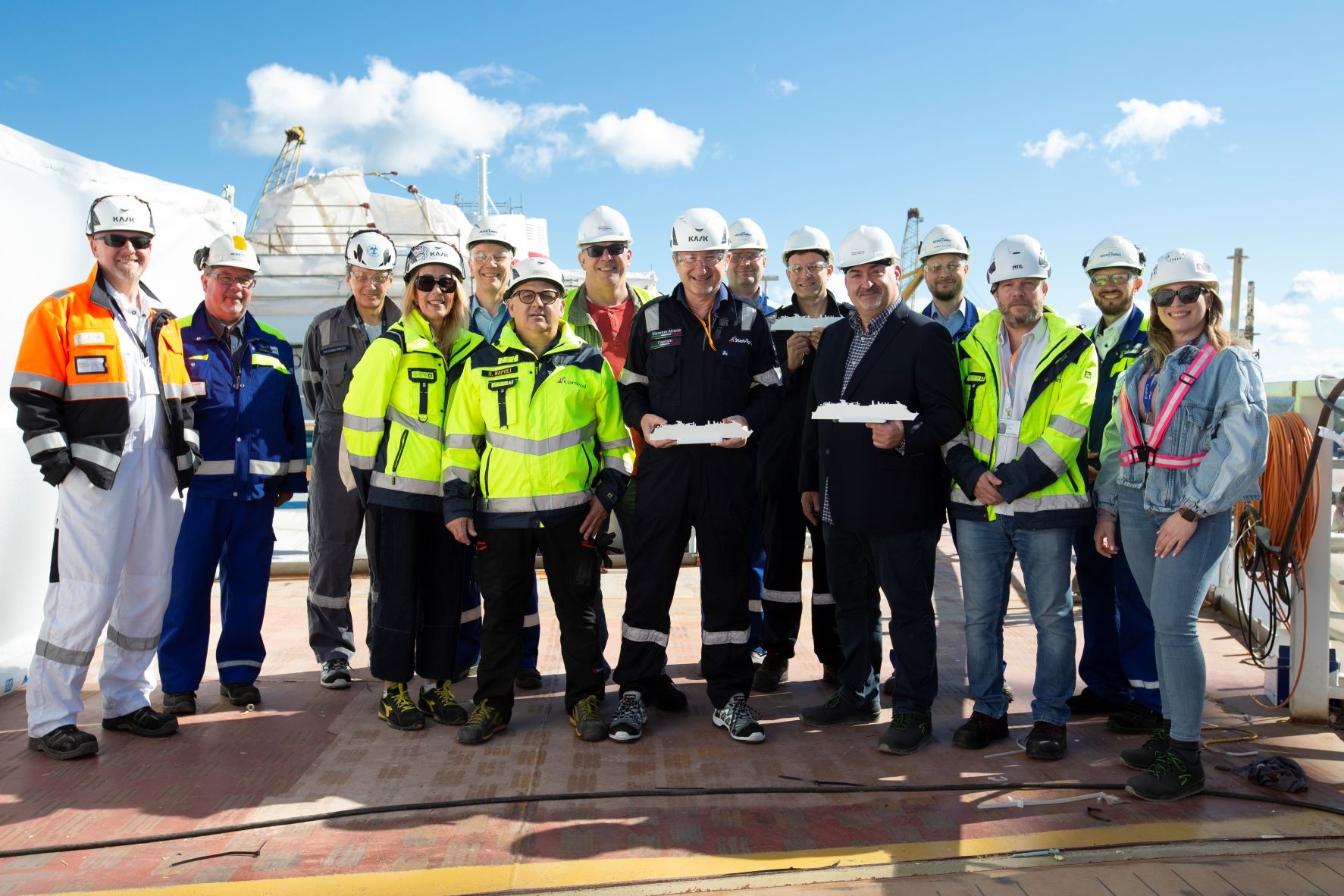 Carnival Cruise Line and Meyer Turku Representatives at Coin Ceremony