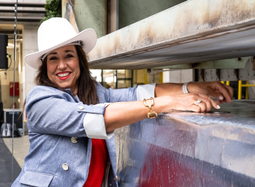 Carnival President Christine Duffy places official ship coin beneath Carnival Jubilee's keel