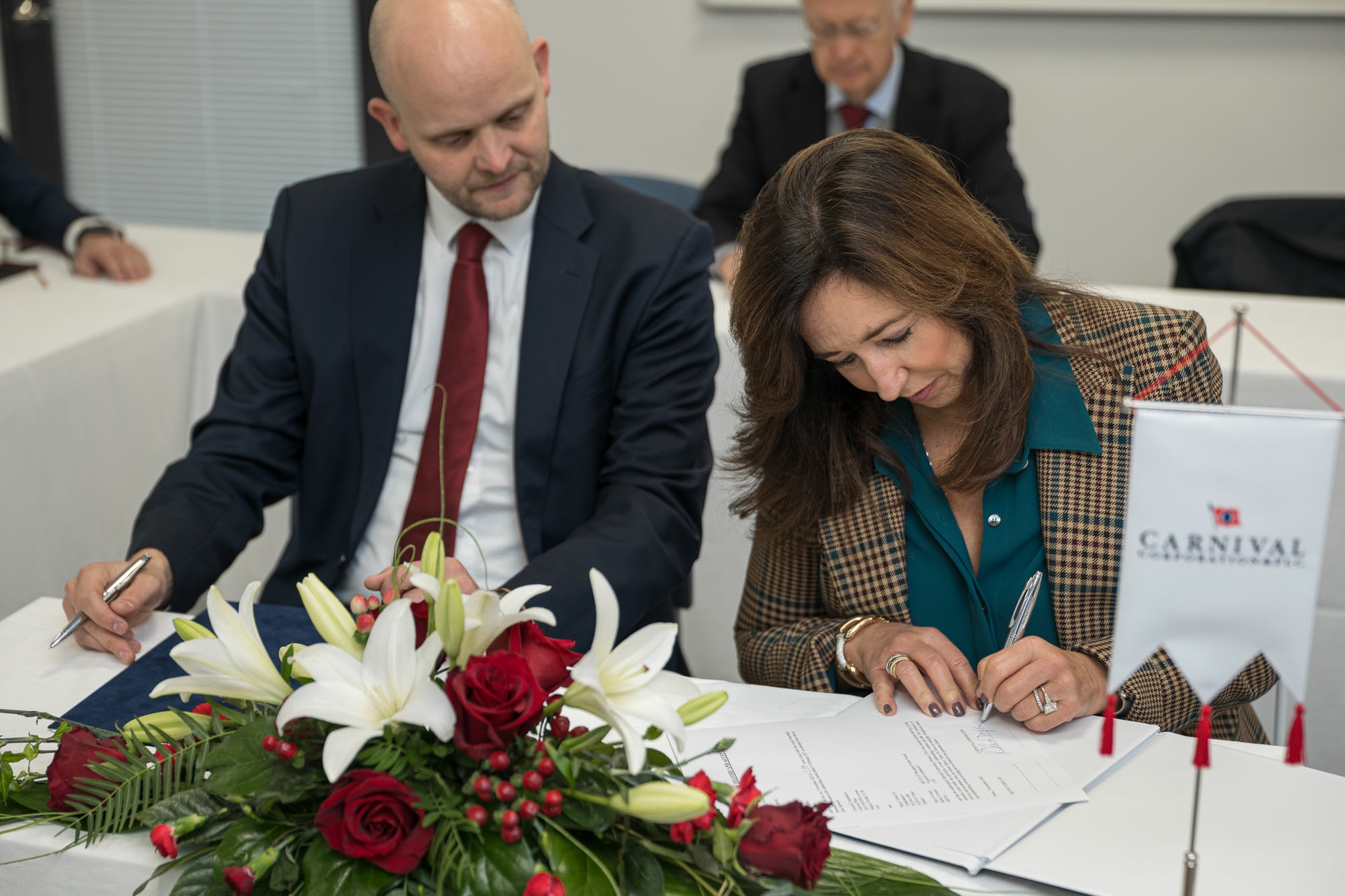 Carnival President Christine Duffy at signing ceremony