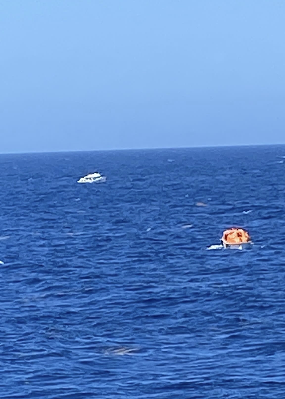 Carnival Valor crew rescuing three men from Honduras