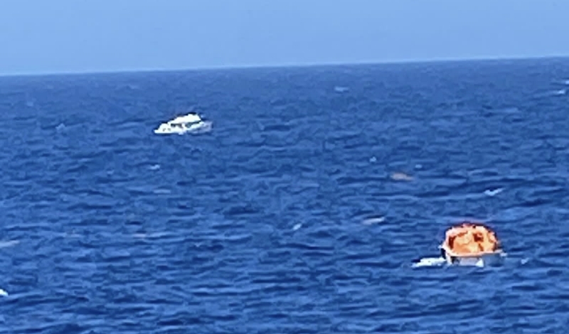 Carnival Valor crew rescuing three men from Honduras