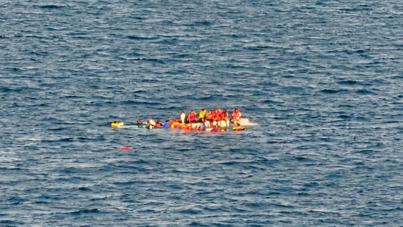 17 People Near Capsized Boat