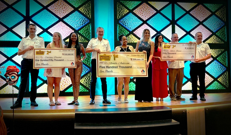 Winners of Carnival's 1M Slot Tournament are recognized during an awards ceremony aboard Carnival Celebration