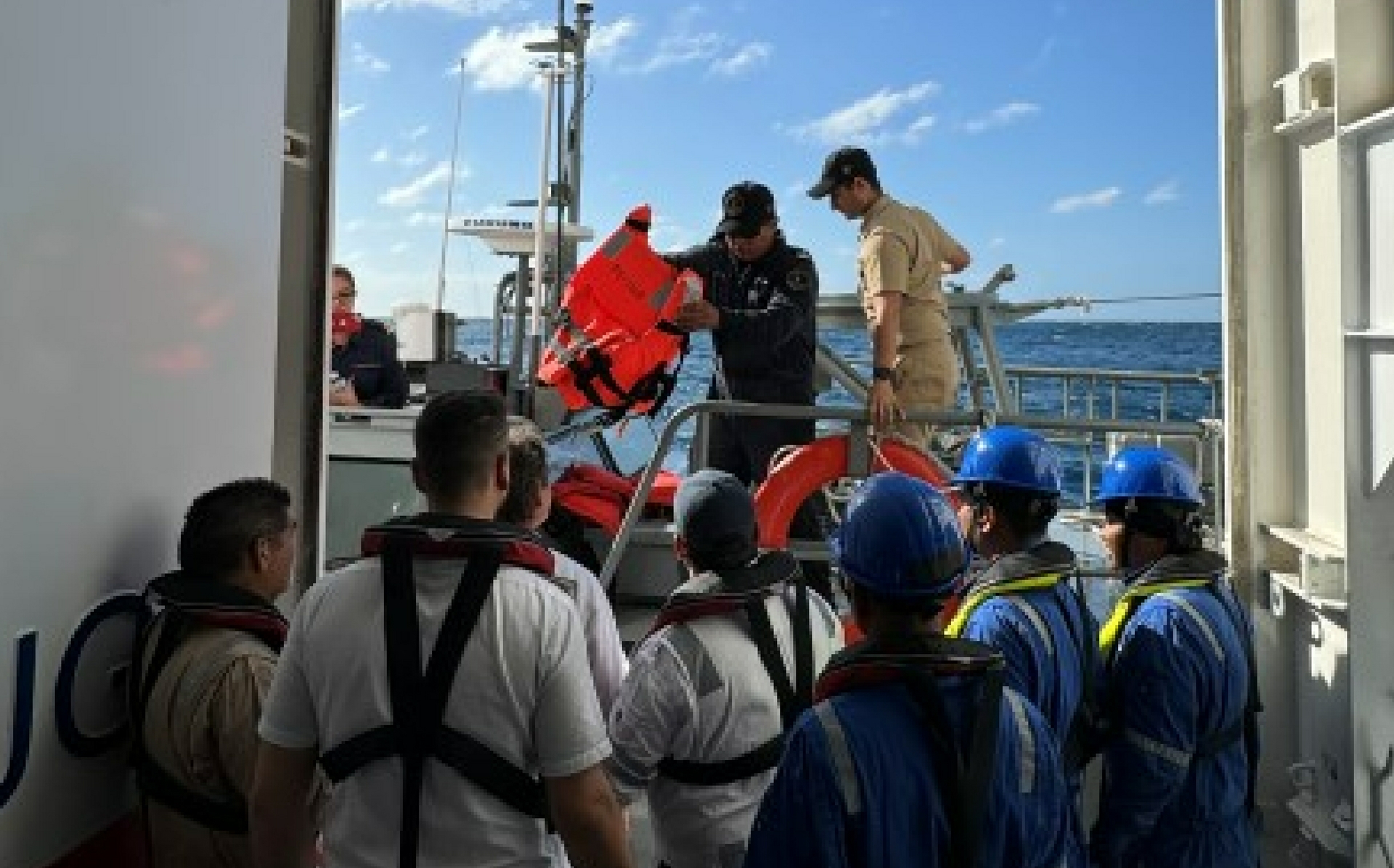 The ship's team coordinated a safe transfer of the rescued men with Mexican Navy officials