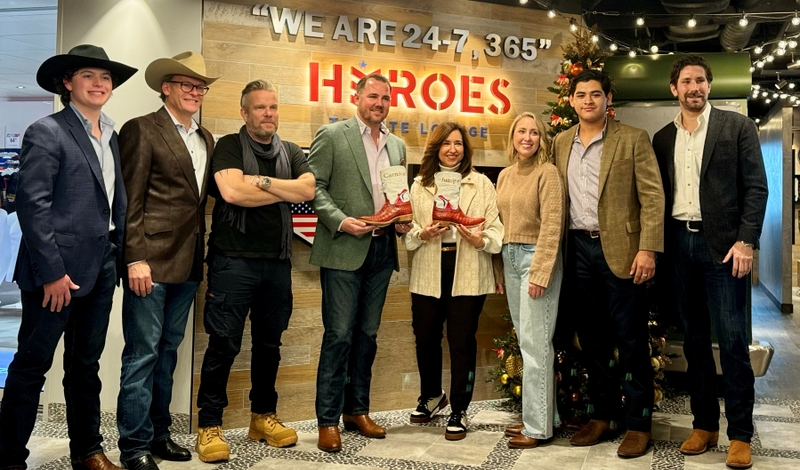 Carnival President Christine Duffy received her pair of handcrafted Carnival Jubilee boots from the bootmakers at Parker Boot Company