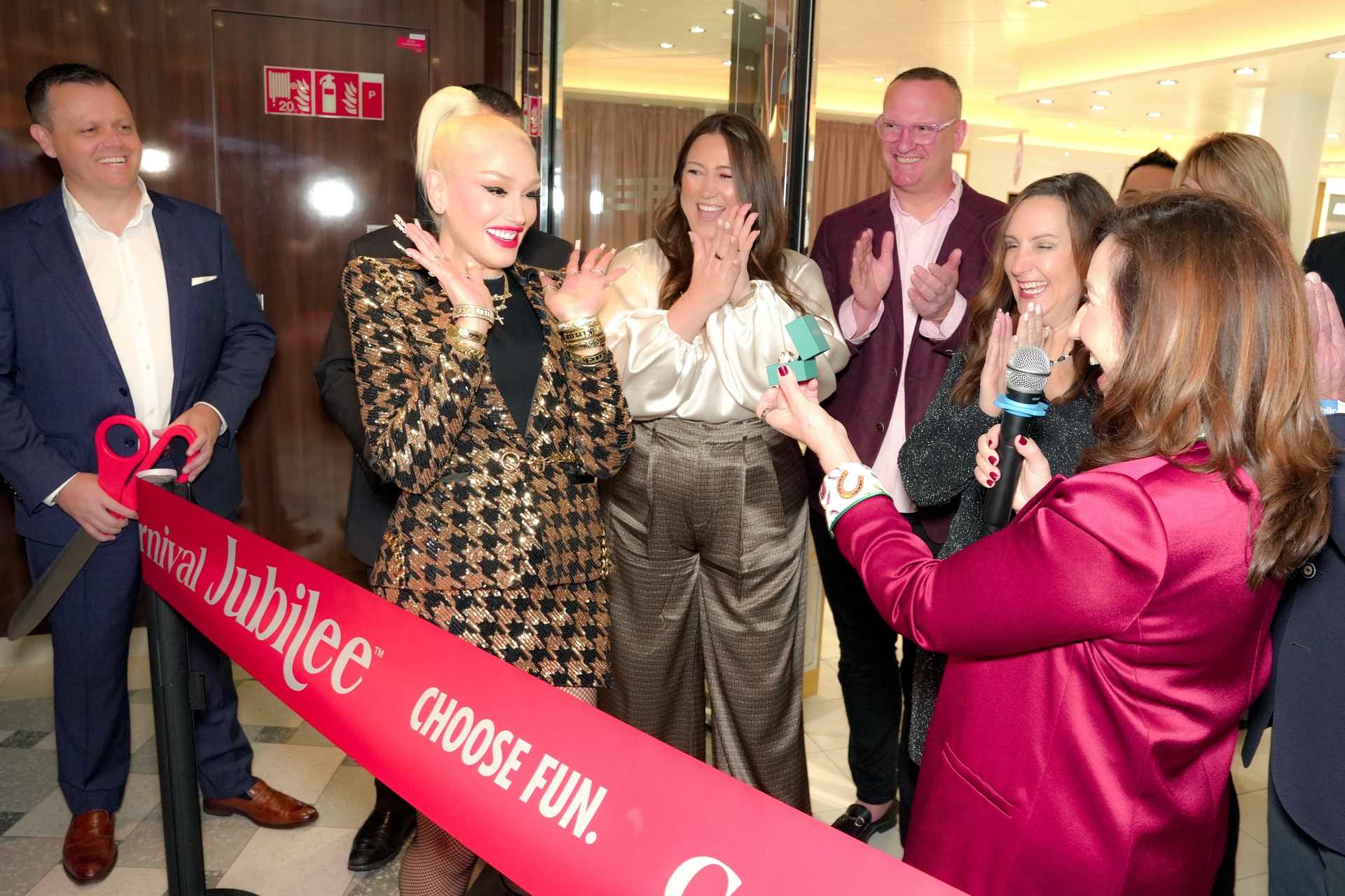 Christine Duffy presents Gwen Stefani with her godmother gift an EFFY Legacy panther ring