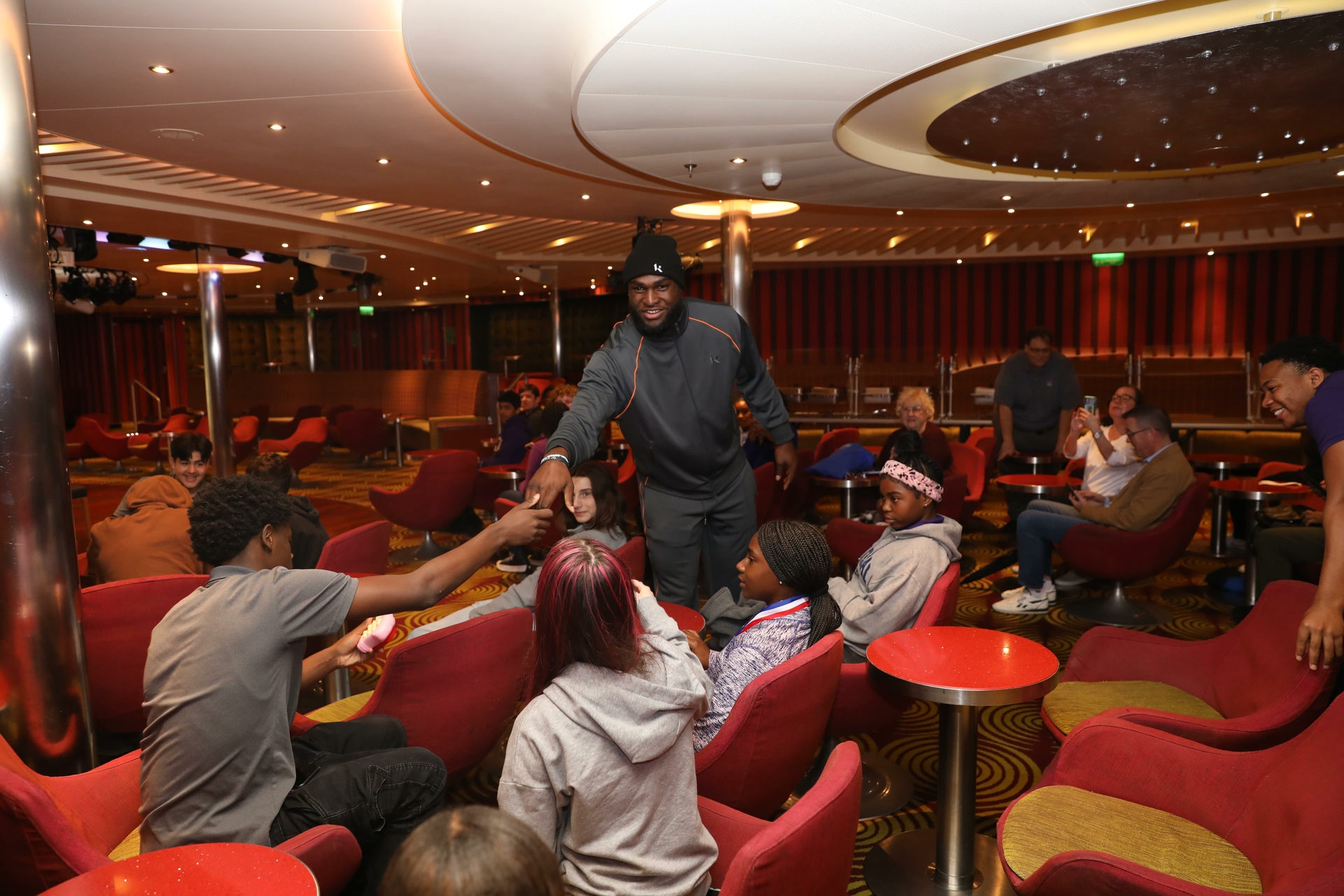 Rookie of the Year Will Anderson Jr. speaks with local kids during visit to Carnival Breeze