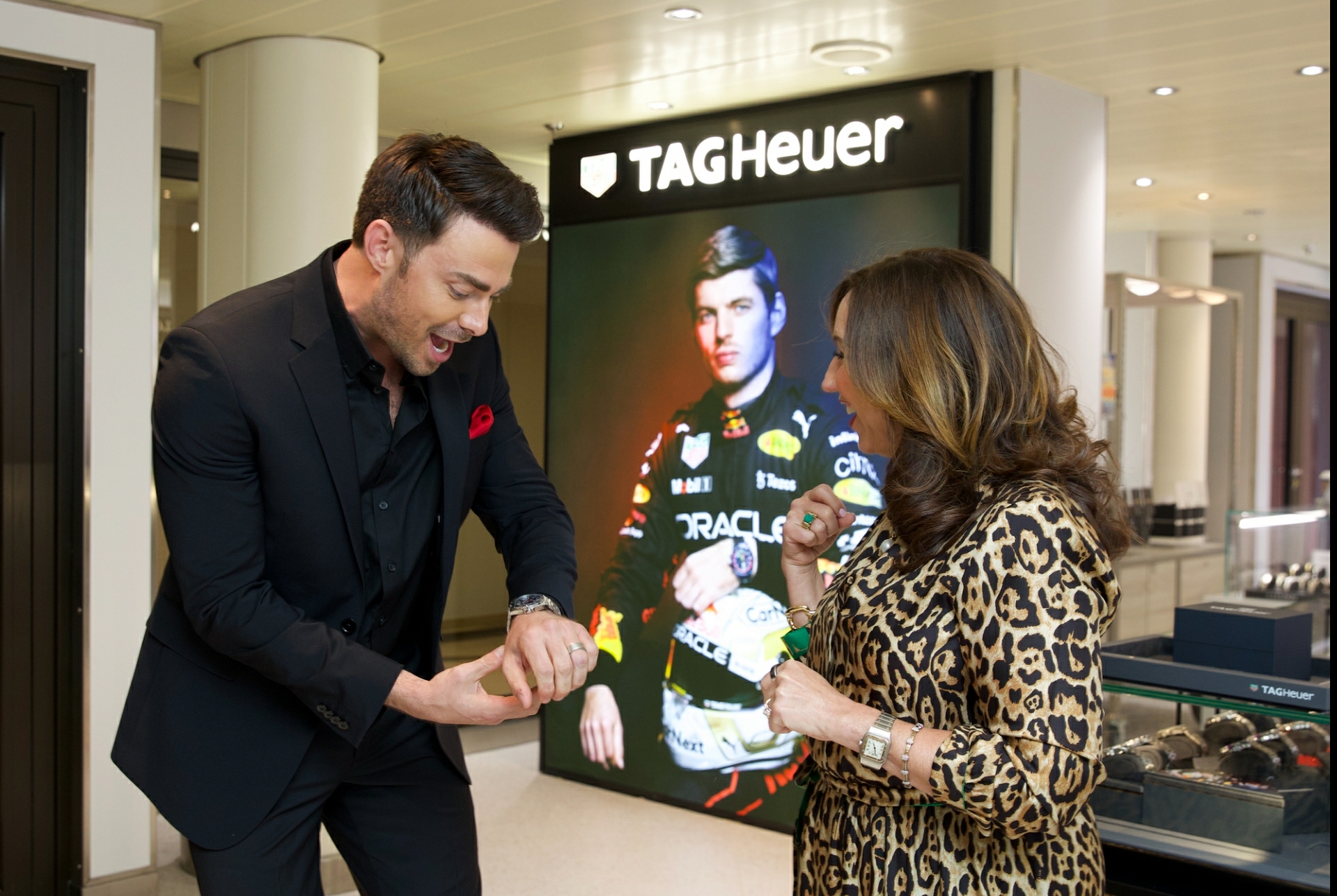 Christine Duffy gives Jonathan Bennett a godfather gift