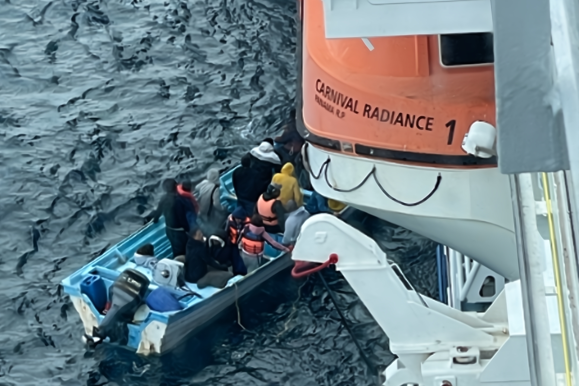 Carnival Radiance team rescues 25 people who were stranded aboard a small boat