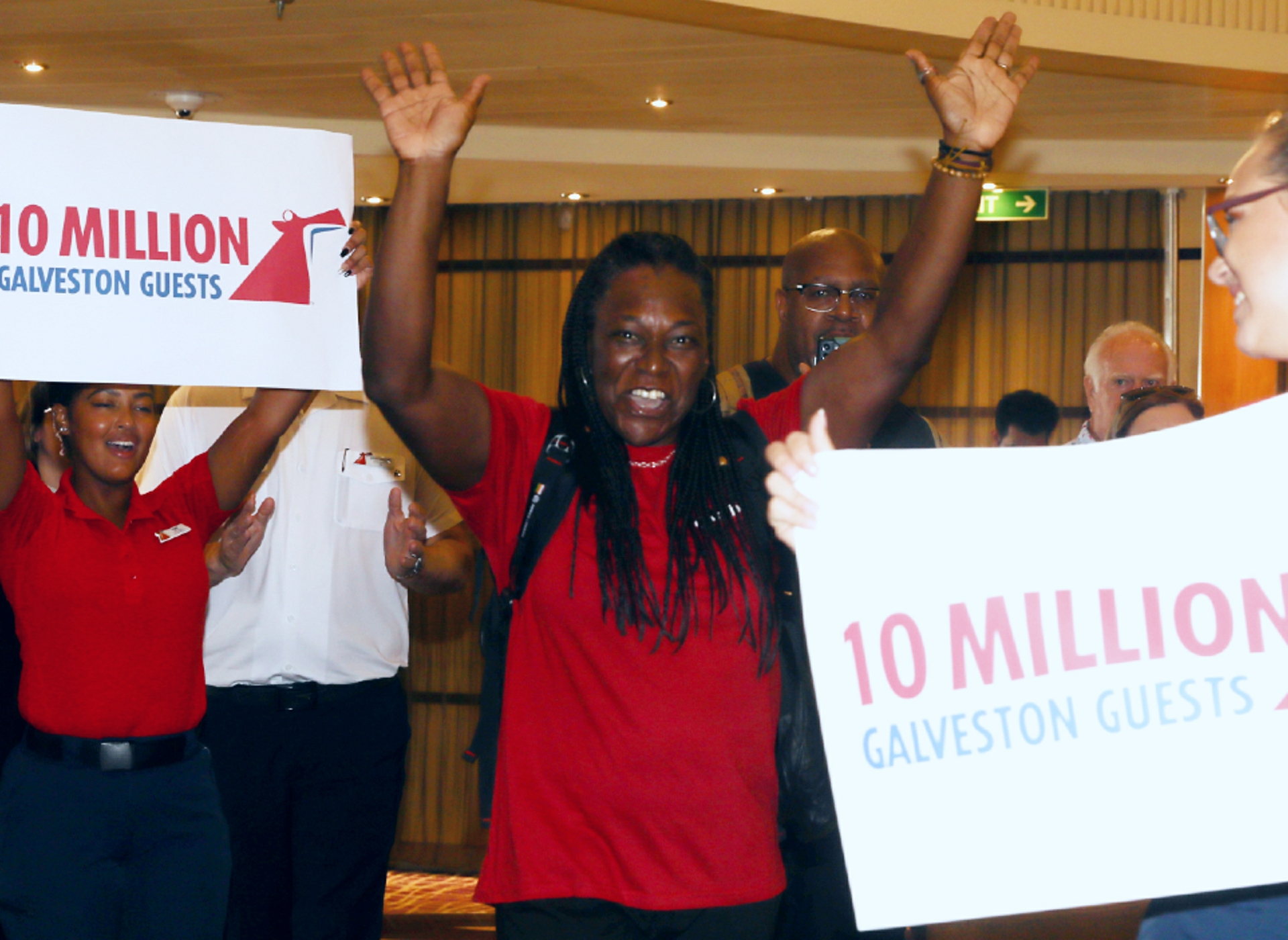 Marsha Taulton boards Carnival Breeze as the 10 millionth Carnival guest embarking from Galveston
