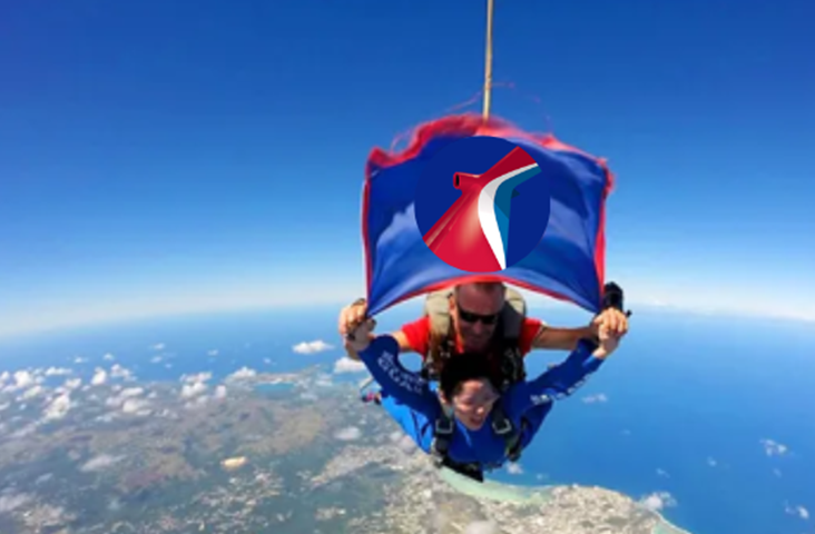 Carnival President Christine Duffy accepts challenge to tandem skydive on Oct. 19 2024