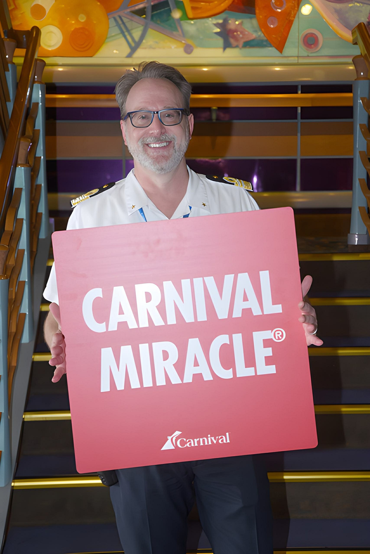 Carnival Miracle Hotel Director Mark Damm welcomes the first guests from Galveston