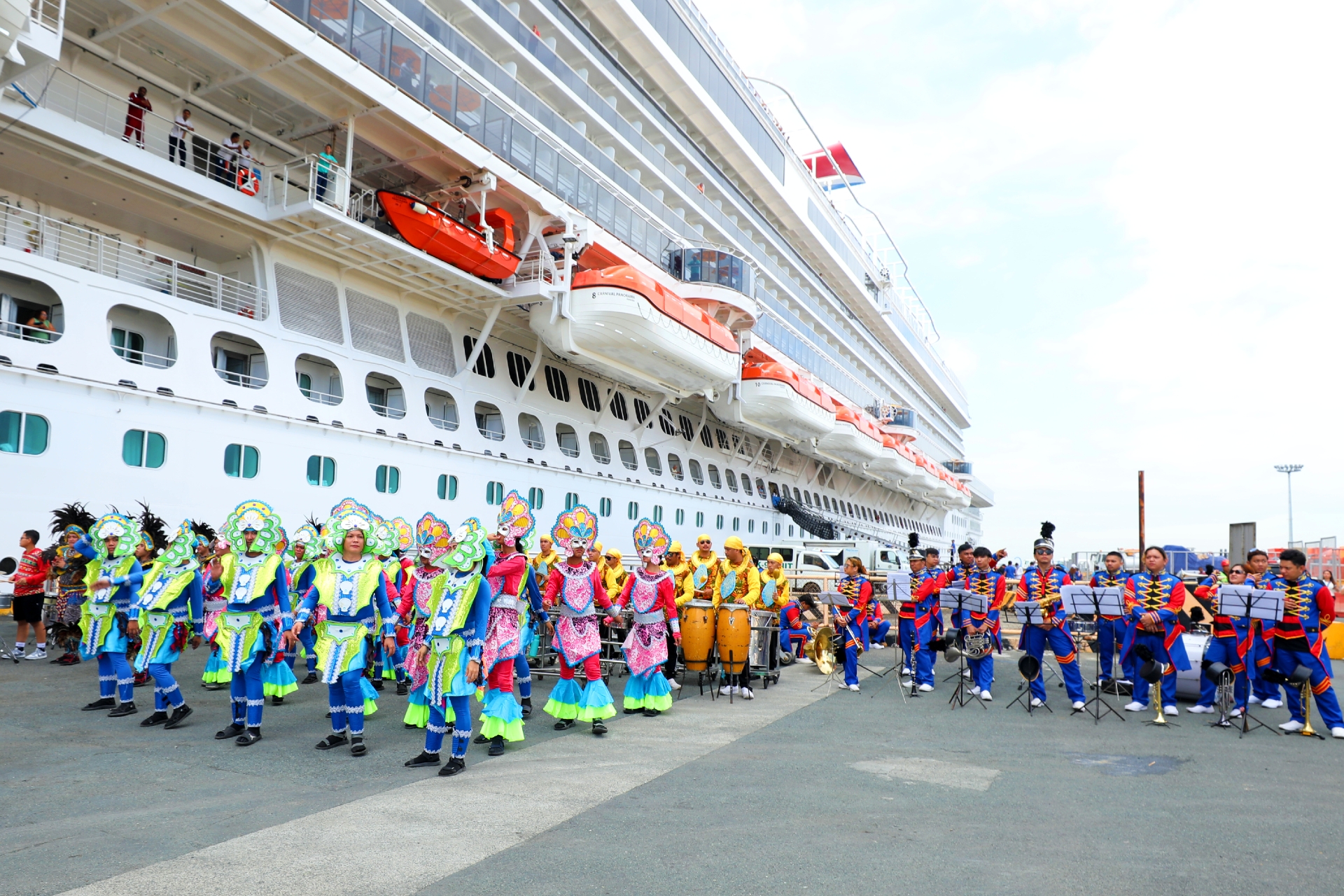 Manilas famous Zamora band brings a vibrant welcome to the ports pier for Carnival Panoramas arrival