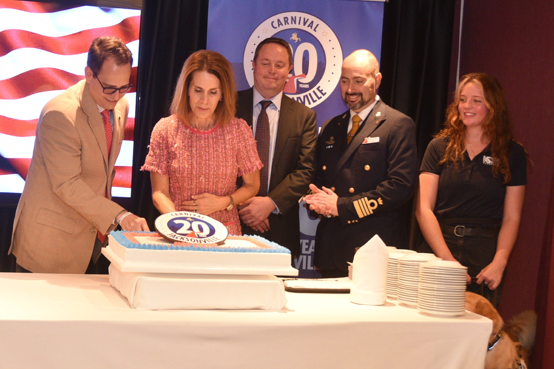 Carnival’s Vice President of Port Operations David Candib and JAXPORT Board Chair Wendy Hamilton cut a 20th anniversary cake