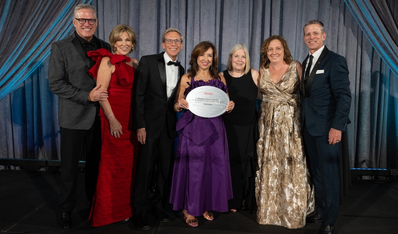 Carnival Cruise Line President Christine Duffy joined by other leadership exectuives to accept award at Travel Weekly Awards Ceremony