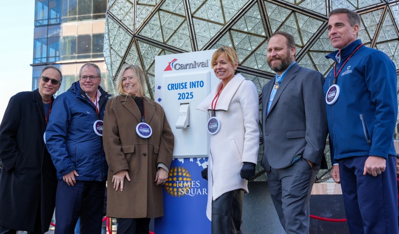 Carnival and military hero guests help light the iconic New Year’s Eve Ball