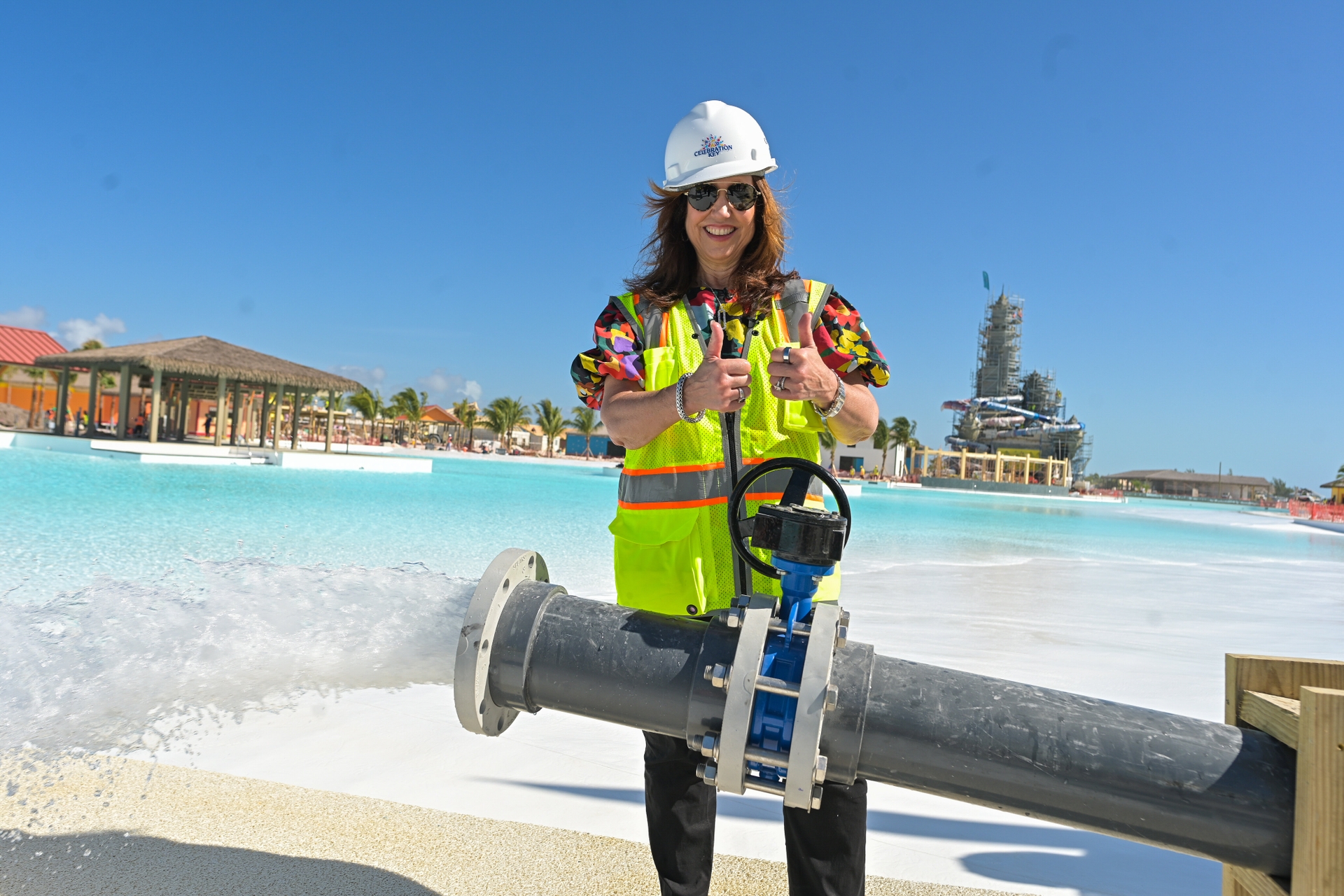 Carnival President Christine Duffy takes part in the ceremonial filling of Celebration Keys freshwater lagoons