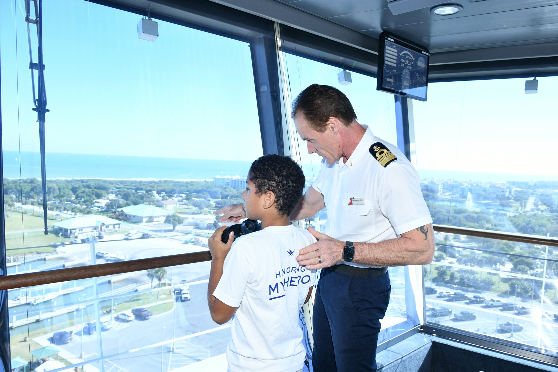 Mardi Gras Captain Alessandro Iemmi with Family of the Fallen on the bridge