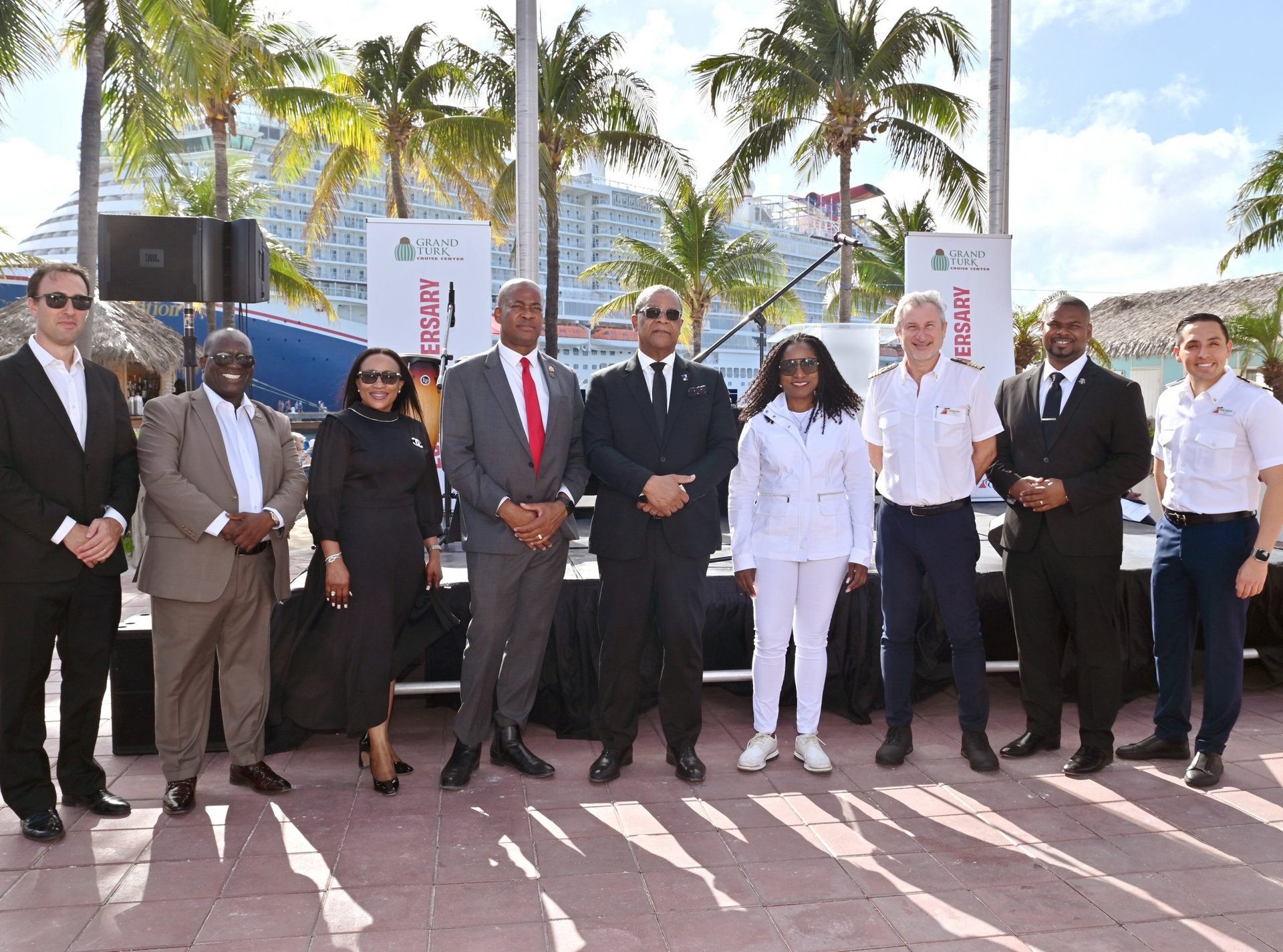 The Hon. Premier Charles Misick, Cabinet Members and Carnival executives join celebration of Grand Turk's 20th anniversary (Image at LateCruiseNews.com - March 2026)