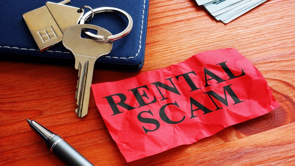house keys with red paper rental scam