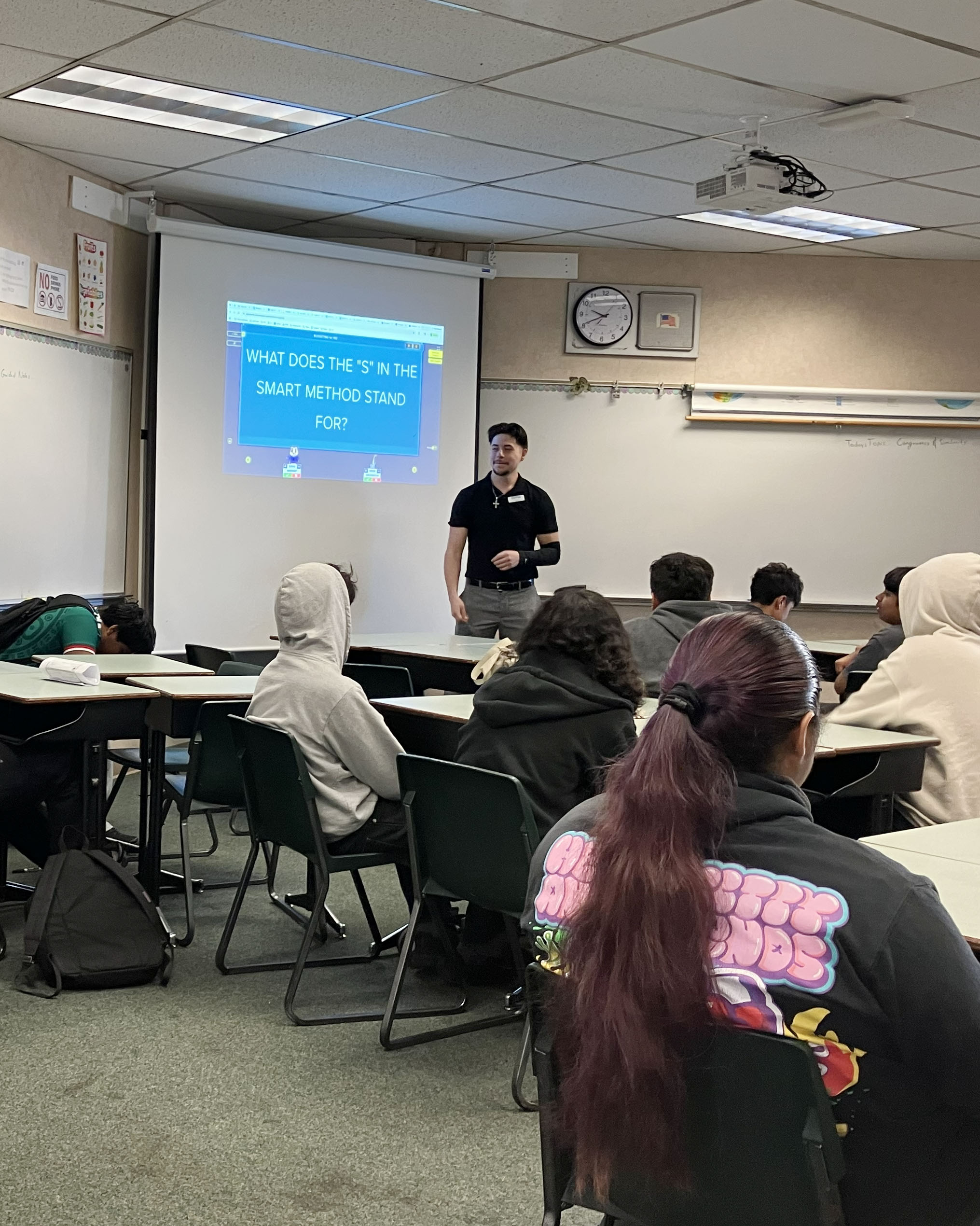 One CEFCU team member providing a financial literacy session to eighth-grade students in San Jose, CA.