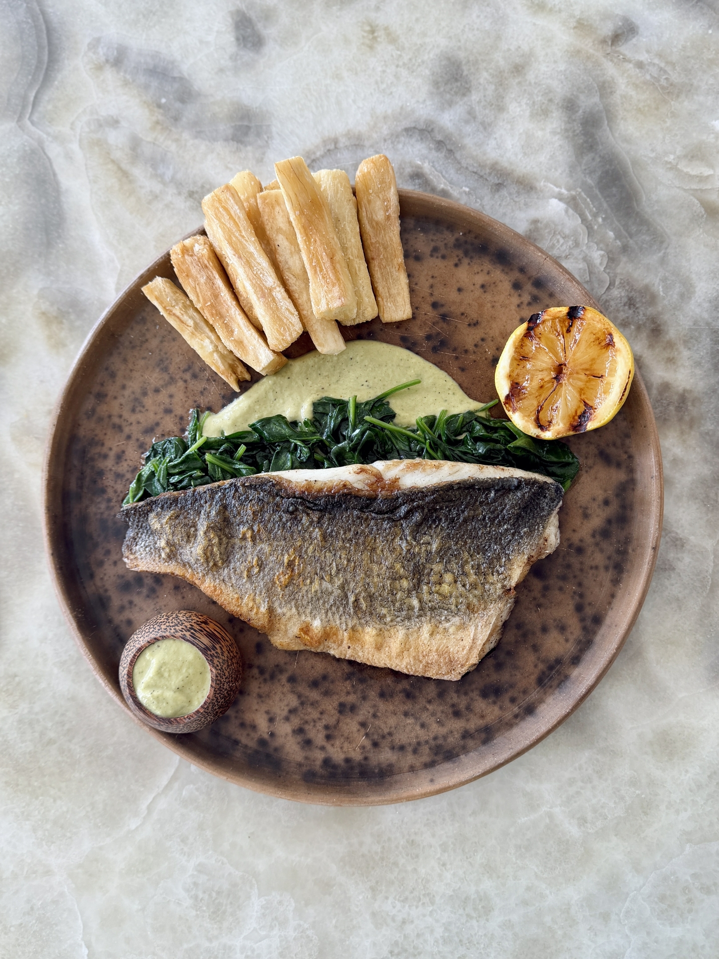 Chef Andy Allo's Crispy Skin Branzino Filet - Photo by Darcy Hatcher
