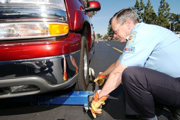 ACSC tow driver hitches up vehicle