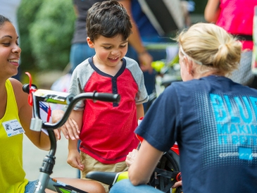 Blue Cross and Blue Shield of North Carolina Partners with USO to Build and Deliver 100 Bikes to Military Children