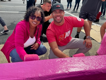 NASCAR Drivers Team With Breast Cancer Survivors Paint Pit Wall Pink 