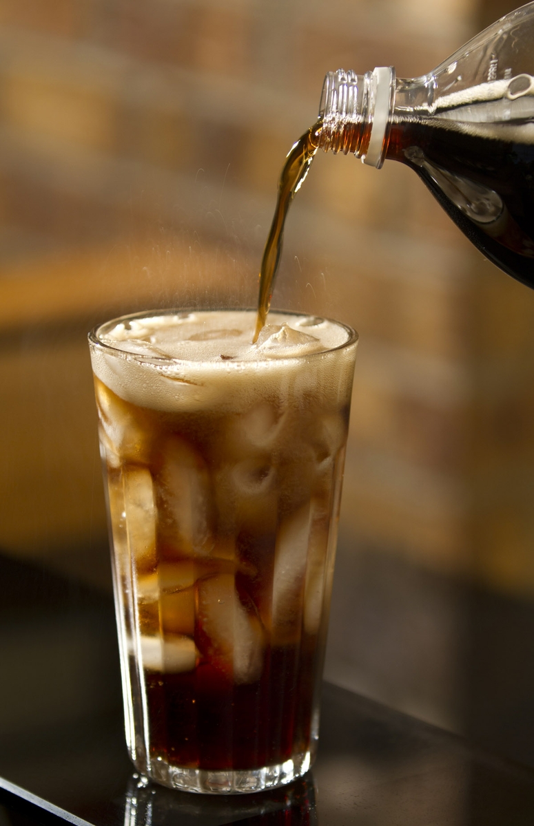 Soft Drink - Cola - pouring with bottle