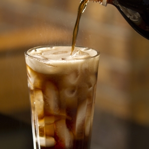 Soft Drink - Cola - pouring with bottle