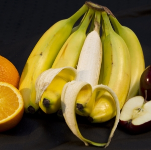 Fruits - Whole Orange with half, Bananas one peeled, Whole Apple with half
