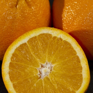 Oranges - close up on half with whole