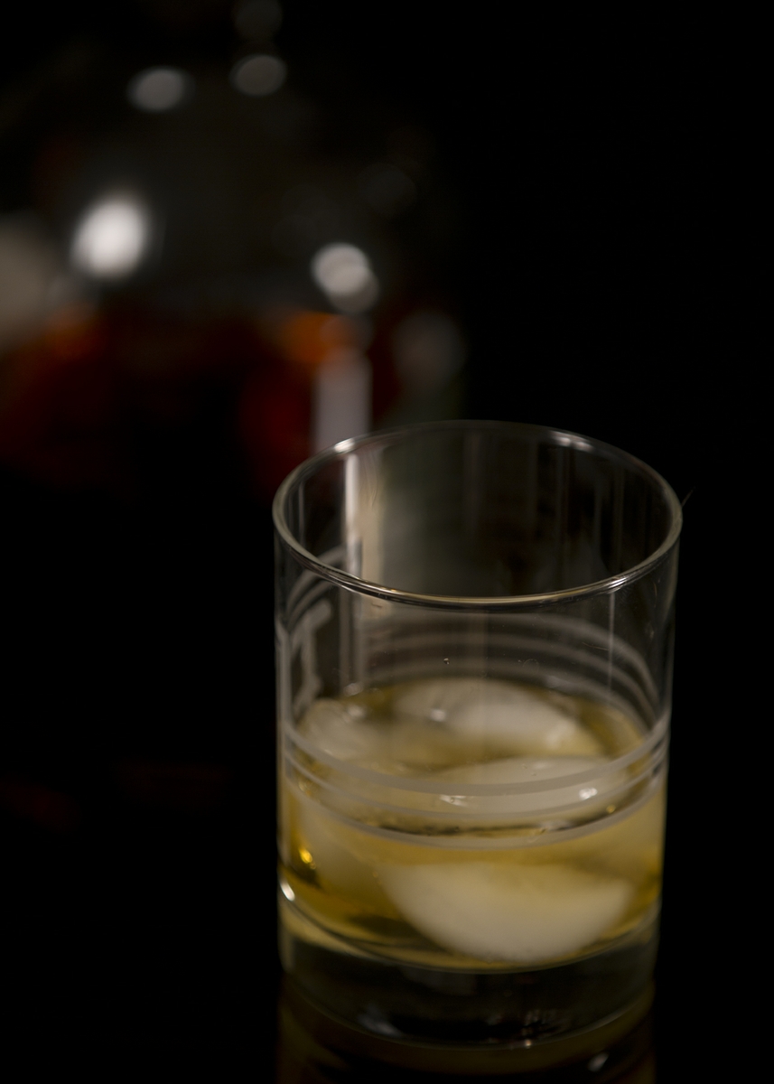 Alcohol - Dark in glass with bottle