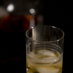 Alcohol - Dark in glass with bottle