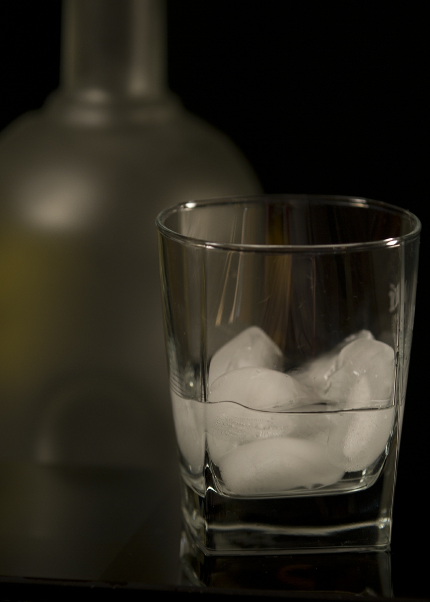 Alcohol - Light in glass with bottle