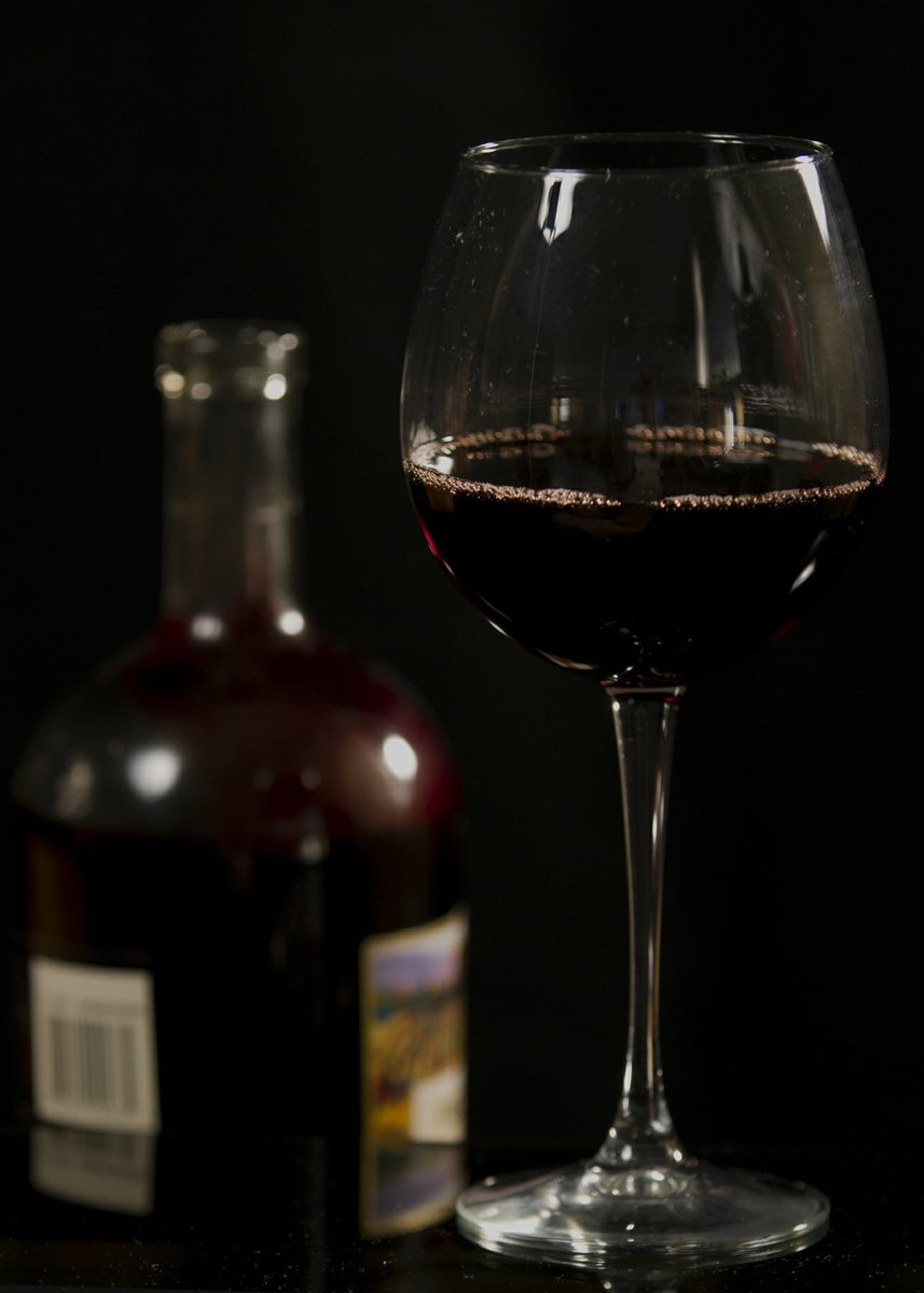 Wine - Red in Glass with bottle straight on