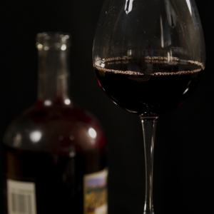 Wine - Red in Glass with bottle straight on