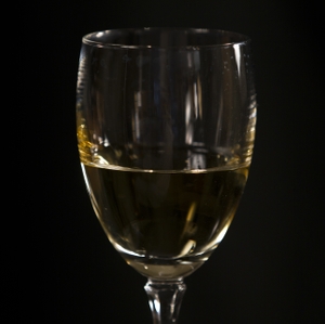 Wine - White in Glass closeup on Glass horizontal