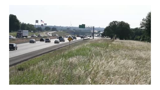 highway traffic -pan to apts