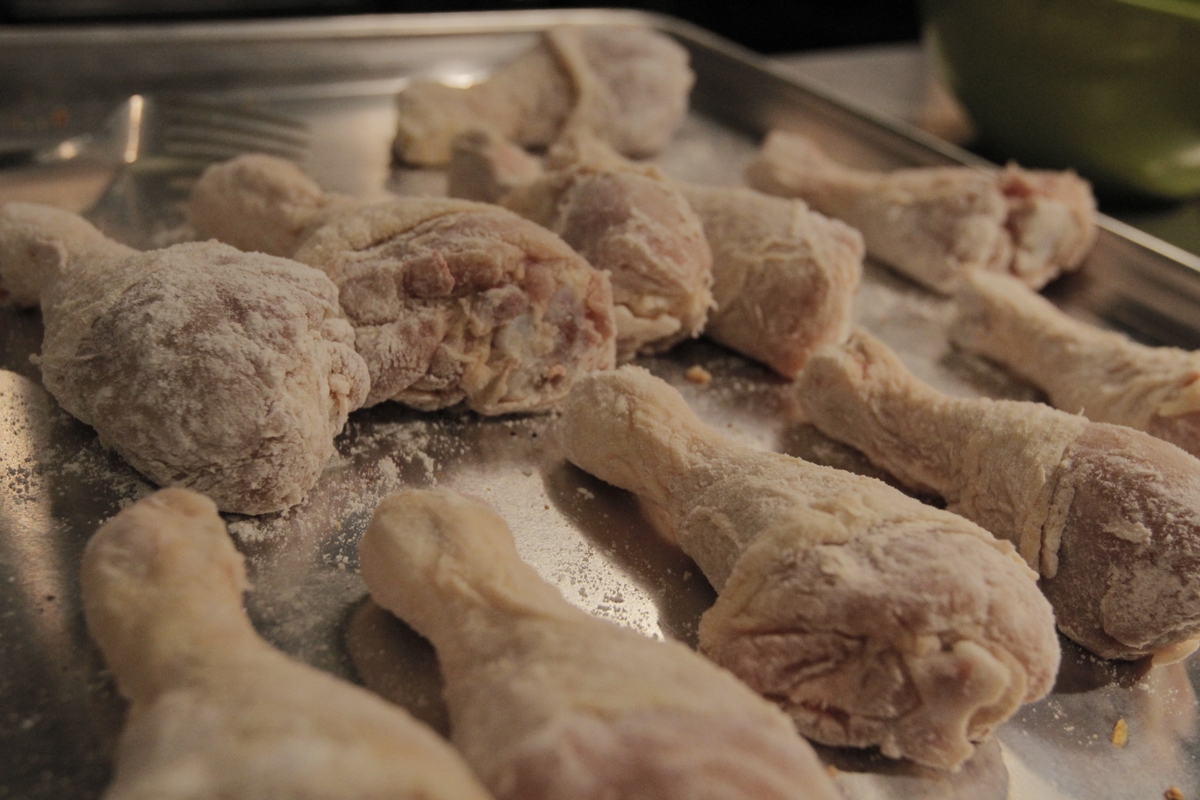 Chicken thighs being prepared