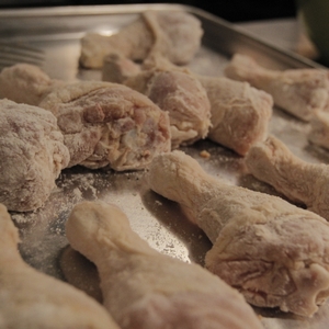 Chicken thighs being prepared