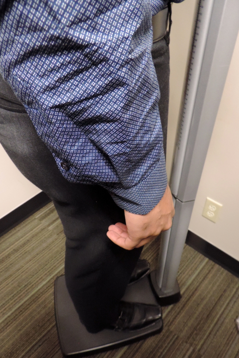 Man steps on scale