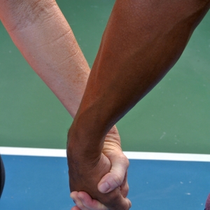 Man and woman holding hands